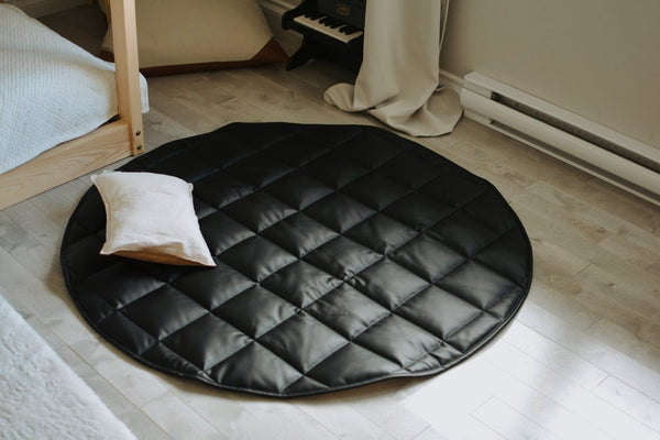 QUILTED FLOOR MAT | 47" | BLACK + CREAM