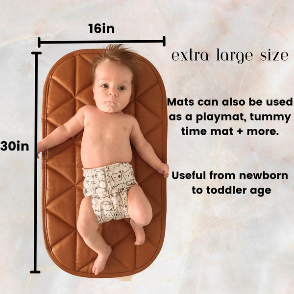 amber changing pad vegan leather showing the size and quality of the mat