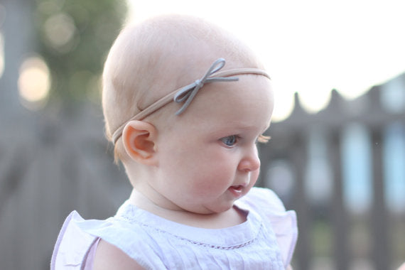 Bandeau boucle de suède pour tête de bébés