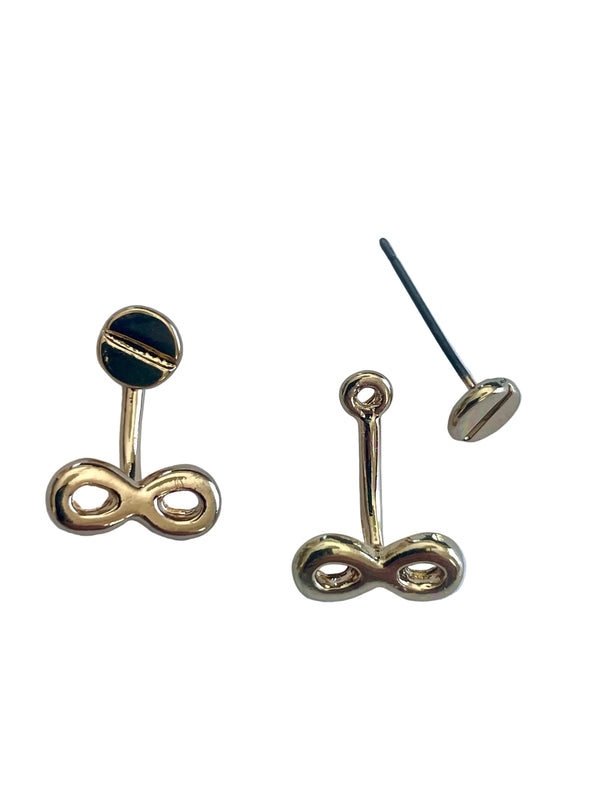 Gold infinity symbol earrings on a light blue background