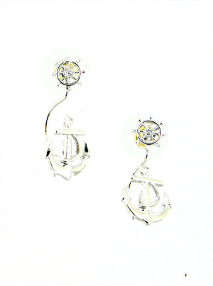 Silver anchor-shaped earrings with clear gemstones on a white background
