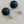 Load image into Gallery viewer, Pair of navy blue spherical earrings with crystal embellishments on a light gray background
