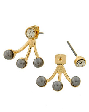 Gold and gray earrings on a white background