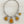 Load image into Gallery viewer, Necklace with yellow stone pendants and silver accents on a dark surface
