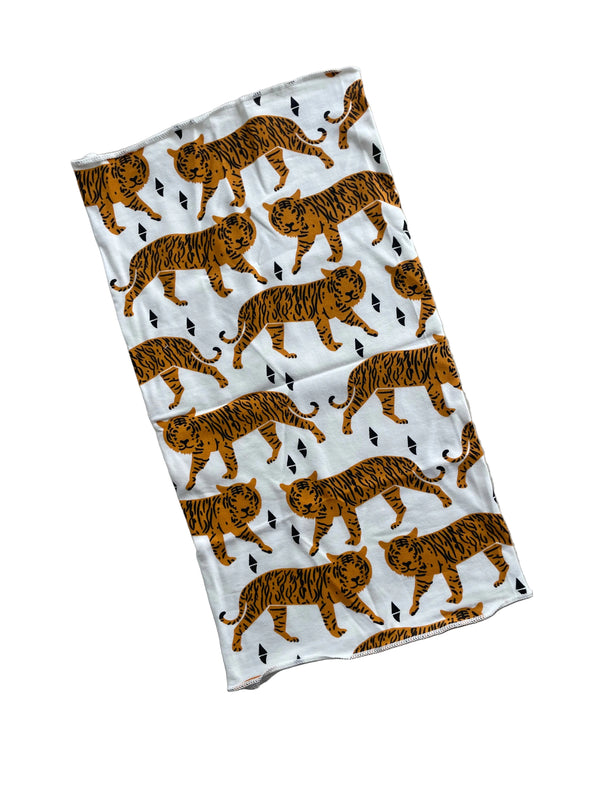 Fabric with tiger pattern on a beige background