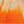 Load image into Gallery viewer, Close-up of orange fabric with a textured pattern on a white background
