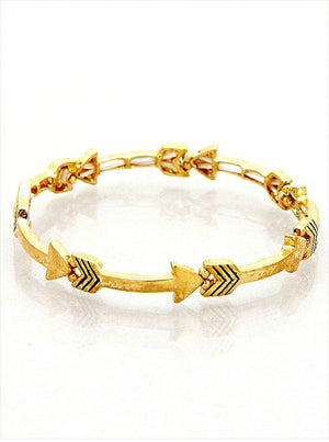 Gold bracelet with arrow designs on a white background