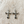 Load image into Gallery viewer, Silver cross-shaped earrings on a wooden surface
