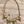 Charger l'image dans la galerie, Golden Edge Statement Necklace – Crystal Triangle Bib Necklace lay flat on a wood
