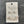 Load image into Gallery viewer, Set of silver earrings on a display card against a dark stone background
