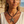 Charger l'image dans la galerie, Woman wearing a starfish necklace on a beach
