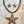 Charger l'image dans la galerie, Starfish-shaped jewelry set on a wooden surface with shells.
