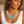 Load image into Gallery viewer, Woman wearing a light blue beaded necklace on a beach
