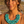 Charger l'image dans la galerie, Woman wearing a turquoise necklace outdoors with a blurred natural background
