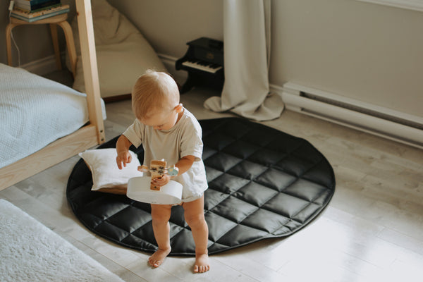 QUILTED FLOOR MAT | 35" | BLACK + CREAM