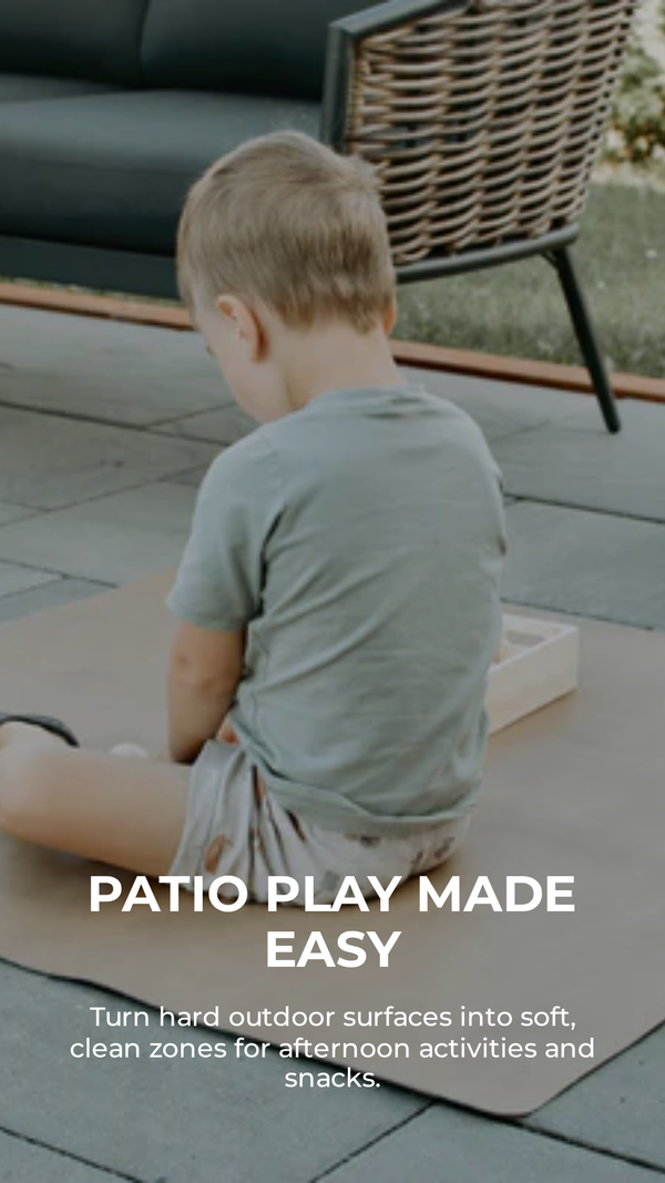 Child sitting on a mat on a patio with text overlay 'Patio Play Made Easy'.