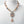 Load image into Gallery viewer, Necklace with pink and gold beads on a mannequin
