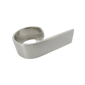 Metallic spoon rest on a white background