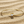 Load image into Gallery viewer, Gold bracelet with a diamond on a sandy background
