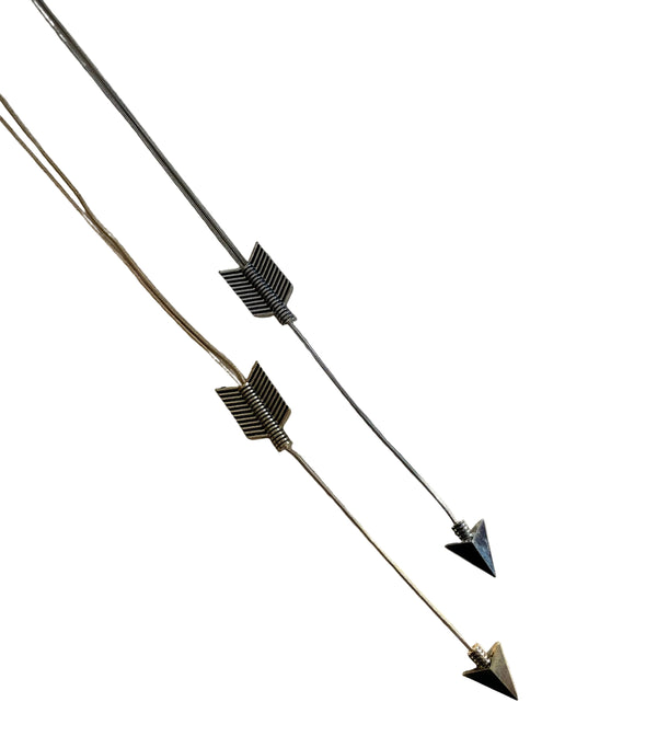 Necklace with arrow-shaped pendants on a light surface
