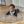 Load image into Gallery viewer, Baby lying on a round beige mat in a kitchen
