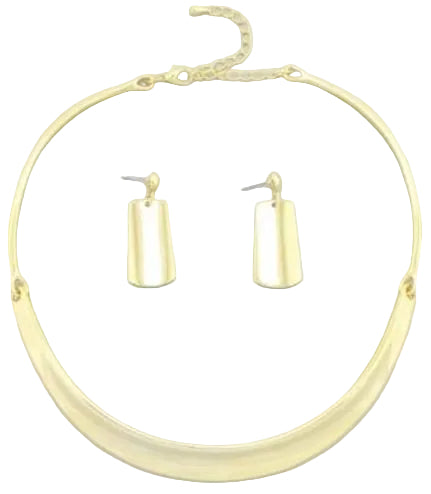Gold necklace and earrings on a light gray background