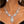 Load image into Gallery viewer, Clear rhinestone necklace and matching earrings worn by a woman
