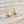 Charger l'image dans la galerie, Matte gold ball stud earrings on pale rustic wood
