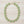 Charger l'image dans la galerie, A green and gold statement necklace featuring round faceted green gemstones in textured gold bezel settings, with a gold-tone chain extender and clasp, shown on a plain white background.

