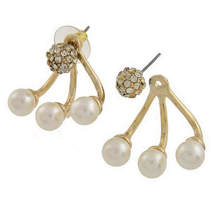Pair of earrings with gold and pearl design on a white background