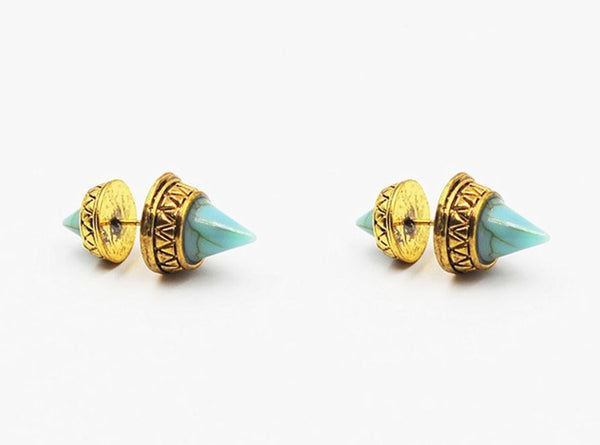 Pair of gold and turquoise spike earrings on a white background