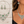 Load image into Gallery viewer, Green crystal necklace and earrings on pale wood and worn by a model
