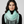 Load image into Gallery viewer, Woman wearing a light blue scarf with fringe details on a gray background
