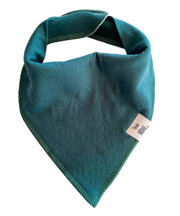 Teal bandana bib with a brand tag on a white background
