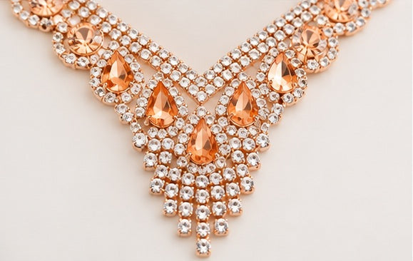 Peach teardrop crystal statement necklace close-up