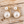 Load image into Gallery viewer, Double faux pearl ear jacket earrings on pale barnwood
