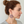 Load image into Gallery viewer, Woman wearing a pair of purple earrings against a plain background
