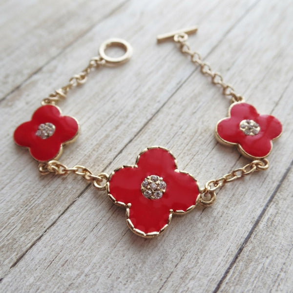 red clover crystal center gold bracelet