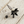 Load image into Gallery viewer, Black and pearl earring on a wooden surface
