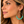 Load image into Gallery viewer, Woman wearing turquoise beaded gold-tone hoop earrings, 2.75 inch drop
