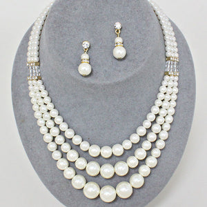 Cream three strand faux pearl necklace and matching earrings original photo