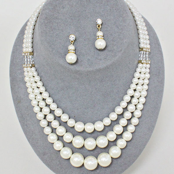 Cream three strand faux pearl necklace and matching earrings original photo