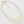 Load image into Gallery viewer, Cream three strand faux pearl necklace on white background original photo
