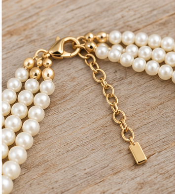 Gold clasp extension chain close up