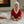 Load image into Gallery viewer, Baby sitting on a round mat in front of a fireplace
