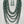 Charger l'image dans la galerie, Long turquoise patina multi-strand necklace with matching earrings on display bust
