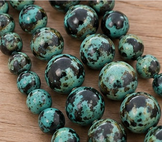 Close-up mottled turquoise green bead texture