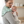 Load image into Gallery viewer, Man holding a baby in a room with a crib and neutral decor
