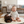 Charger l&#39;image dans la galerie, Baby sitting on a mat with a dog, both smiling, in a living room setting.
