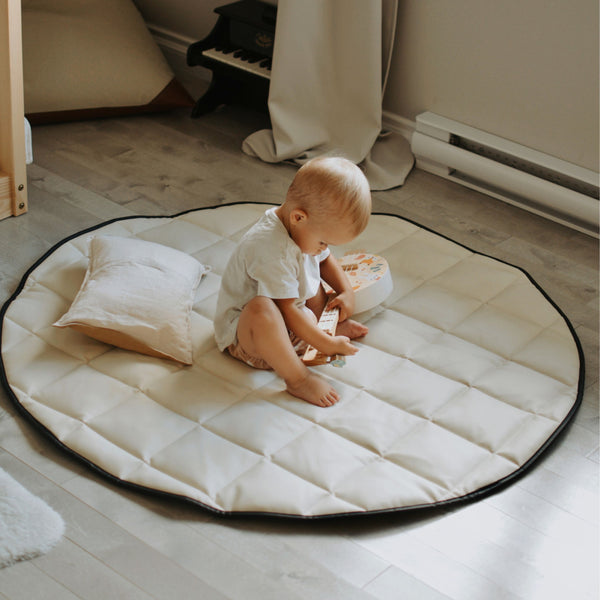 QUILTED FLOOR MAT | 35" | BLACK + CREAM